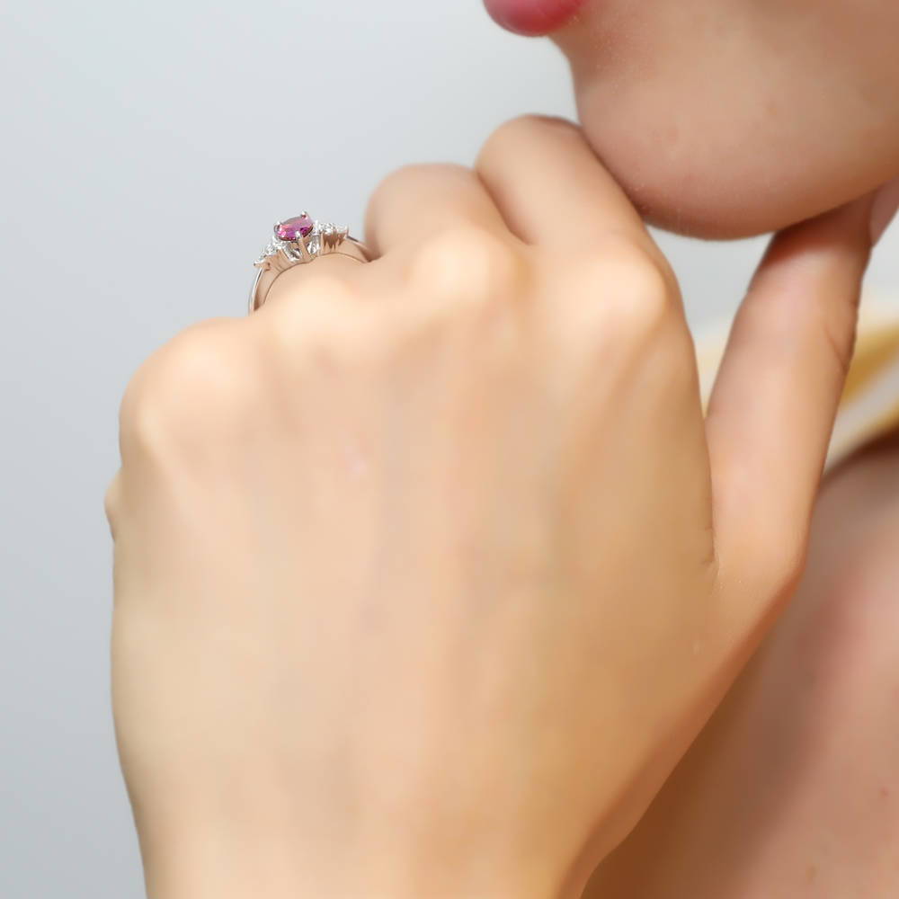 Model wearing Solitaire Red Pear CZ Ring in Sterling Silver 0.8ct