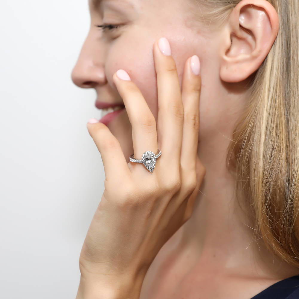 Model wearing Halo Pear CZ Ring in Sterling Silver