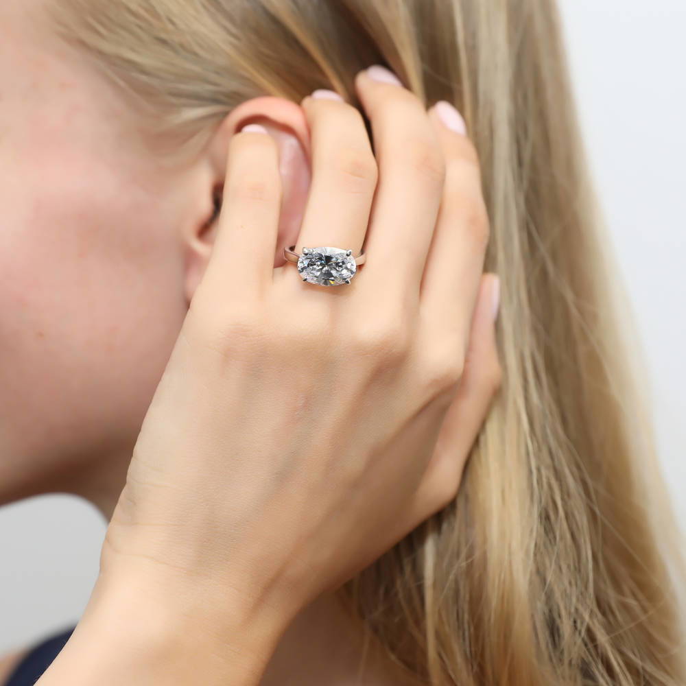 Model wearing Solitaire East-West 5.5ct Oval CZ Statement Ring in Sterling Silver