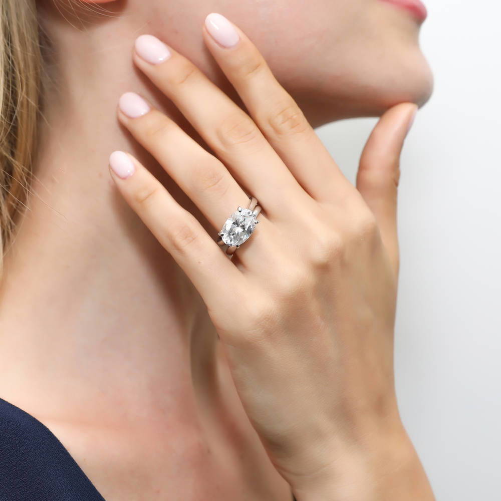 Model wearing East-West Solitaire CZ Ring Set in Sterling Silver