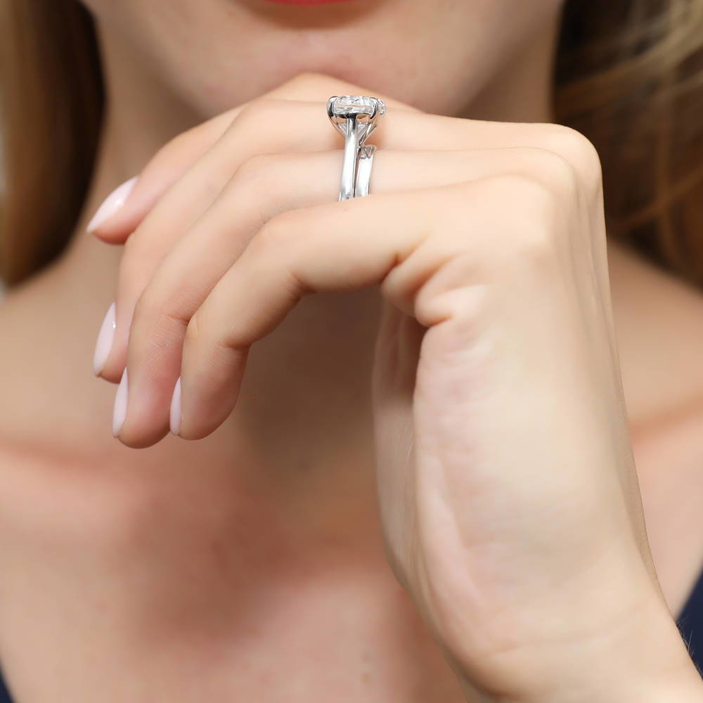 Model wearing East-West Solitaire CZ Ring Set in Sterling Silver