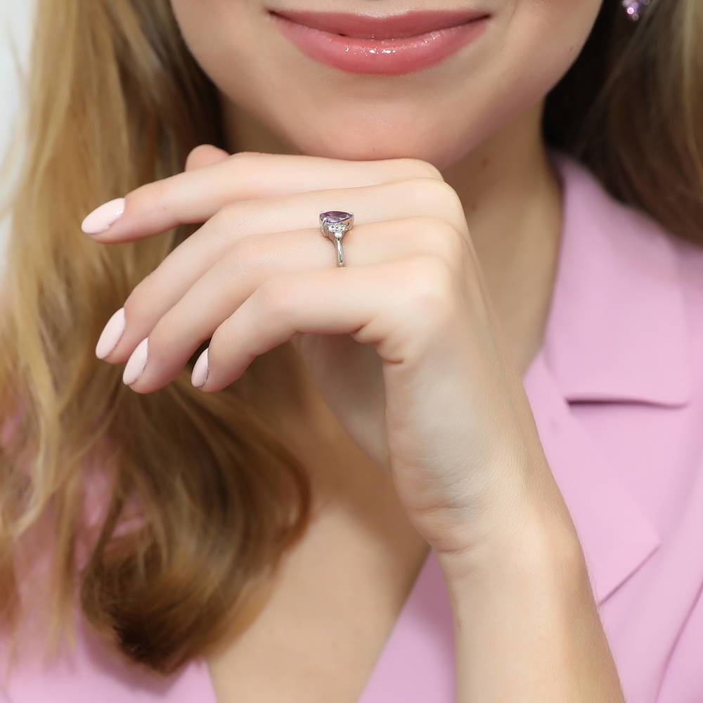 Model wearing Solitaire Purple Pear CZ Ring in Sterling Silver 0.8ct