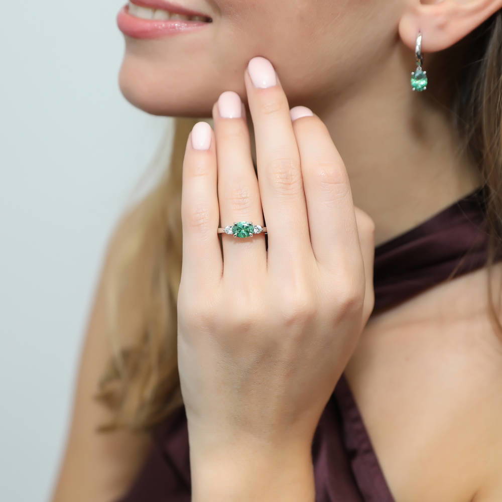 Model wearing 3-Stone East-West Green Oval CZ Ring in Sterling Silver, 2 of 8