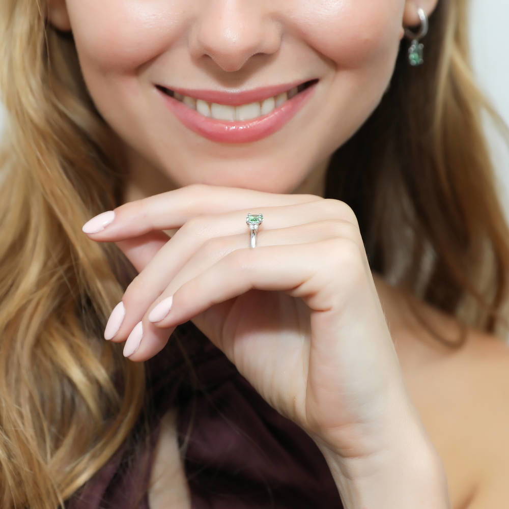 Model wearing 3-Stone East-West Green Oval CZ Ring in Sterling Silver, 6 of 8