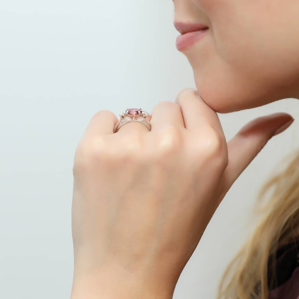 Model wearing 3-Stone East-West Red Oval CZ Ring in Sterling Silver, 3 of 8