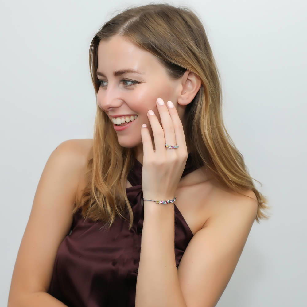 Model wearing Cluster Multi Color CZ Stackable Band in Sterling Silver