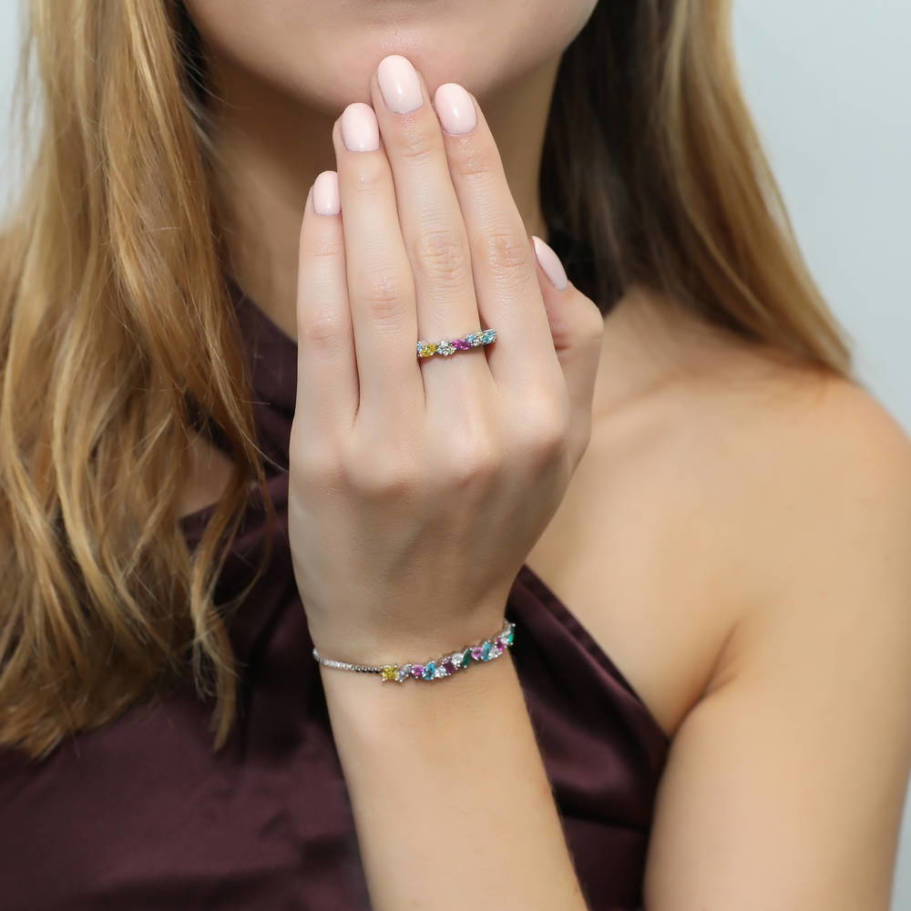 Model wearing Cluster Multi Color CZ Stackable Band in Sterling Silver