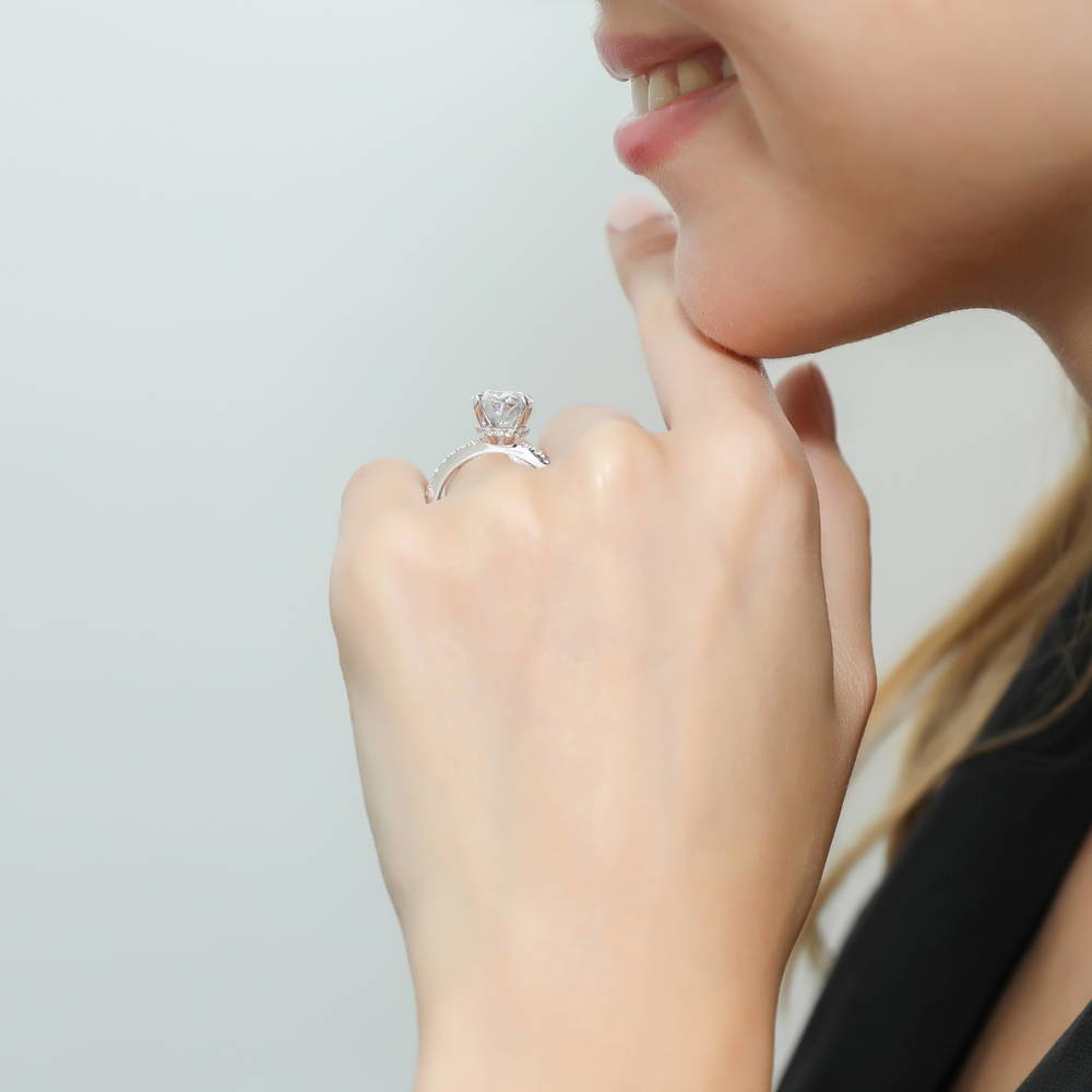 Model wearing Solitaire Hidden Halo 5.5ct Oval CZ Ring in Sterling Silver