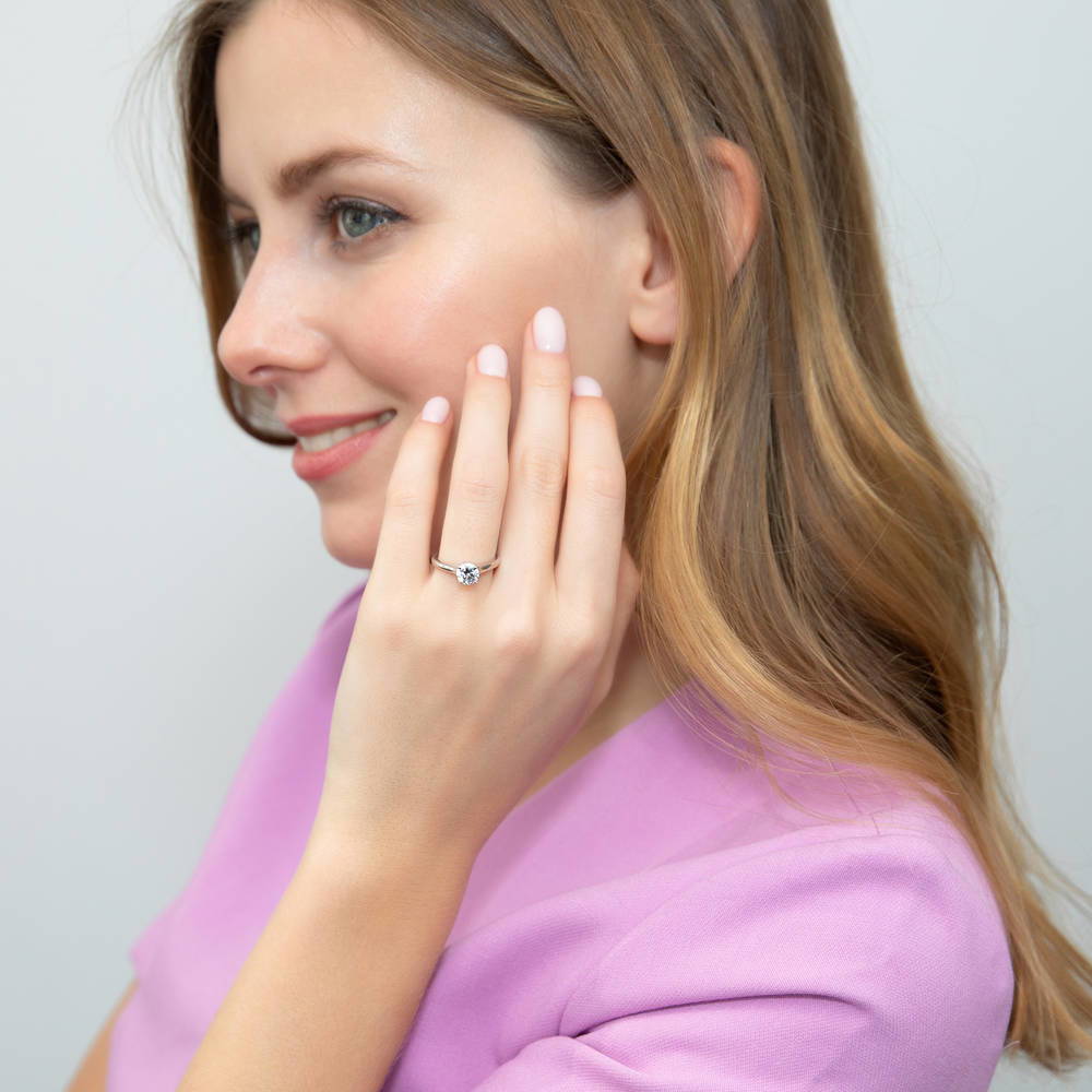 Model wearing Solitaire 0.8ct Round CZ Ring in Sterling Silver, 2 of 8