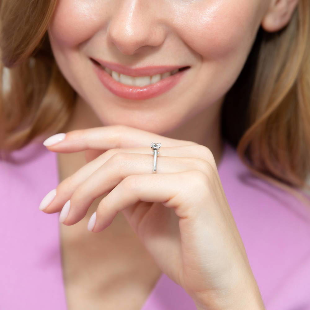 Model wearing Solitaire 0.8ct Round CZ Ring in Sterling Silver, 6 of 8