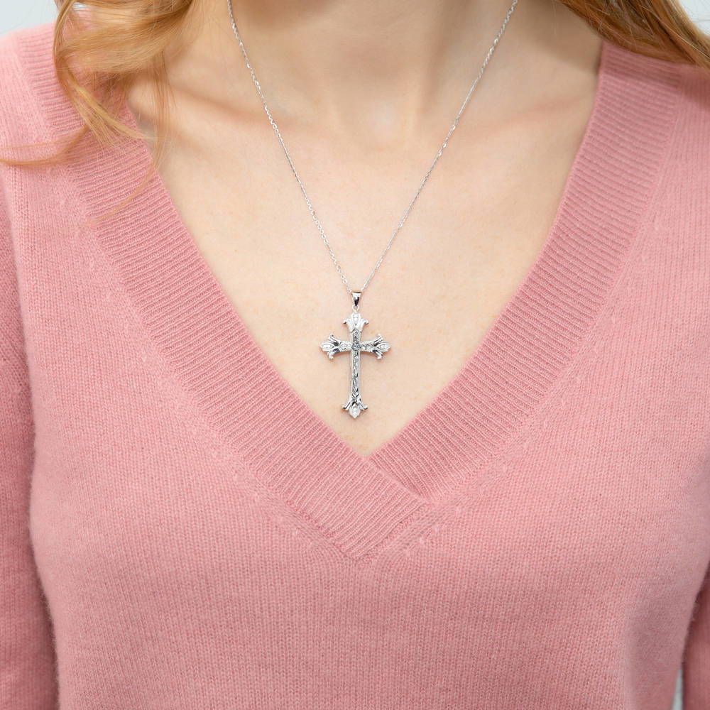 Model wearing Cross Milgrain CZ Pendant Necklace in Sterling Silver