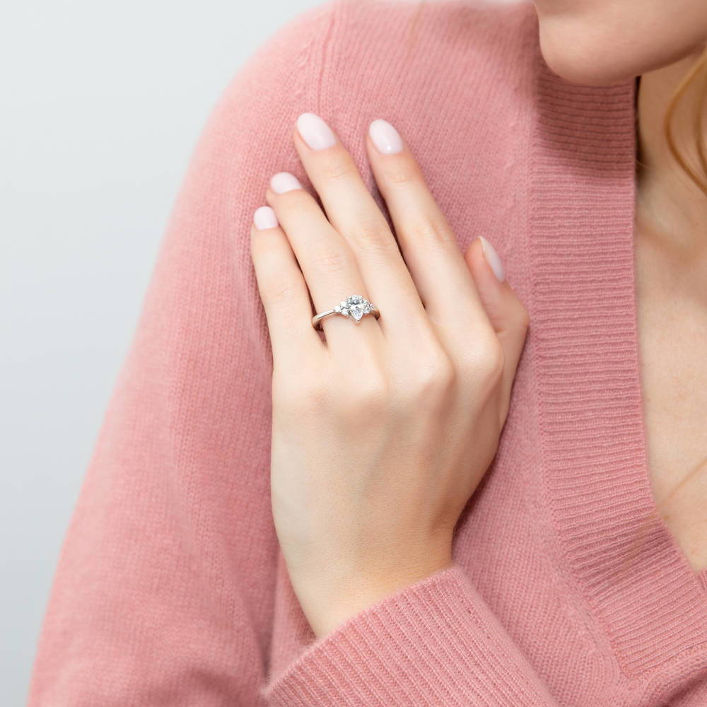 Model wearing Solitaire 0.8ct Pear CZ Ring in Sterling Silver, 2 of 8