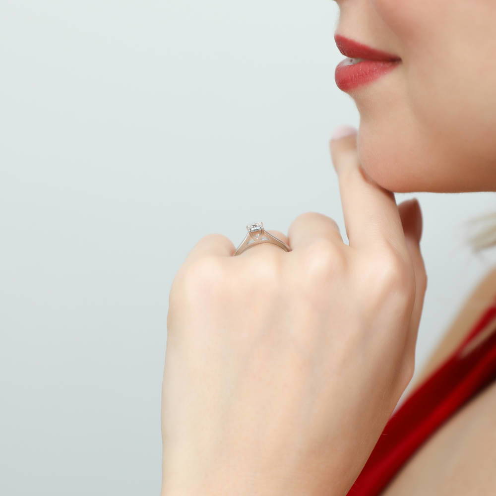 Model wearing Solitaire 0.4ct Princess CZ Ring Set in Sterling Silver, 9 of 14