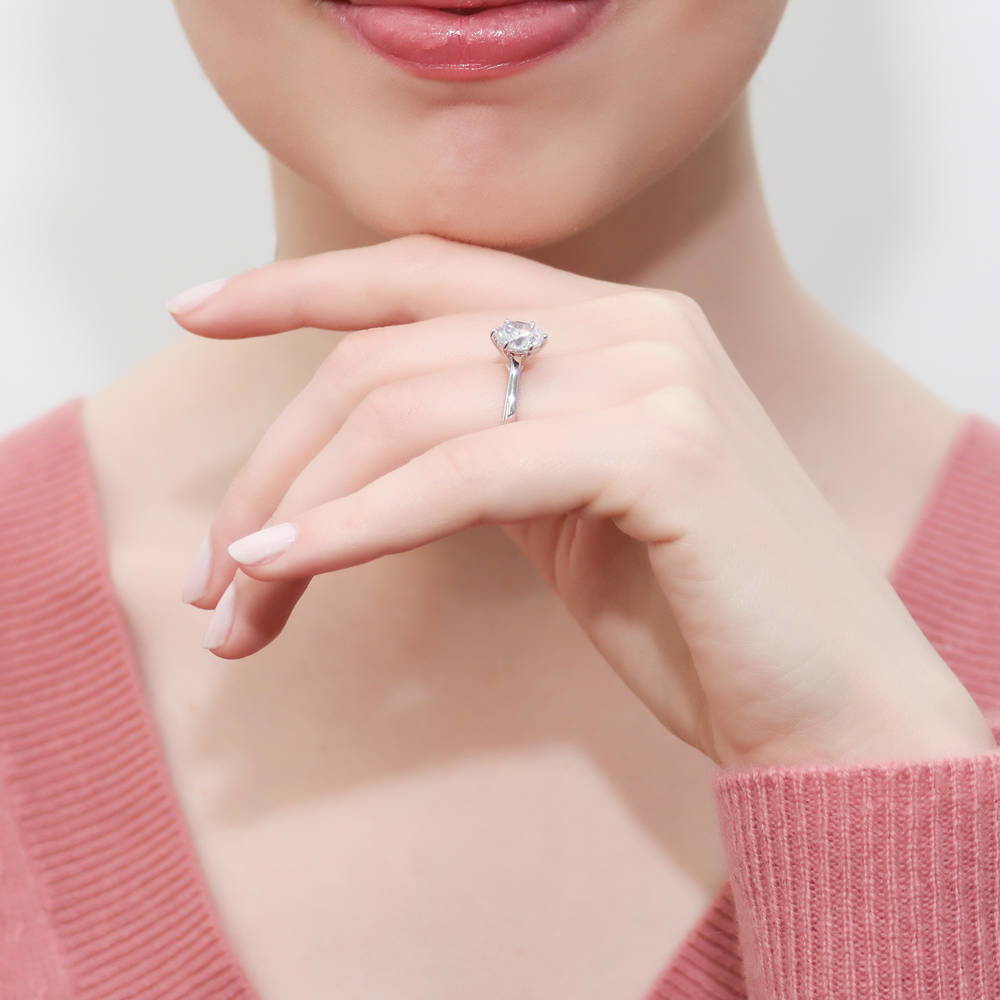 Model wearing Solitaire 2ct Round CZ Ring in Sterling Silver