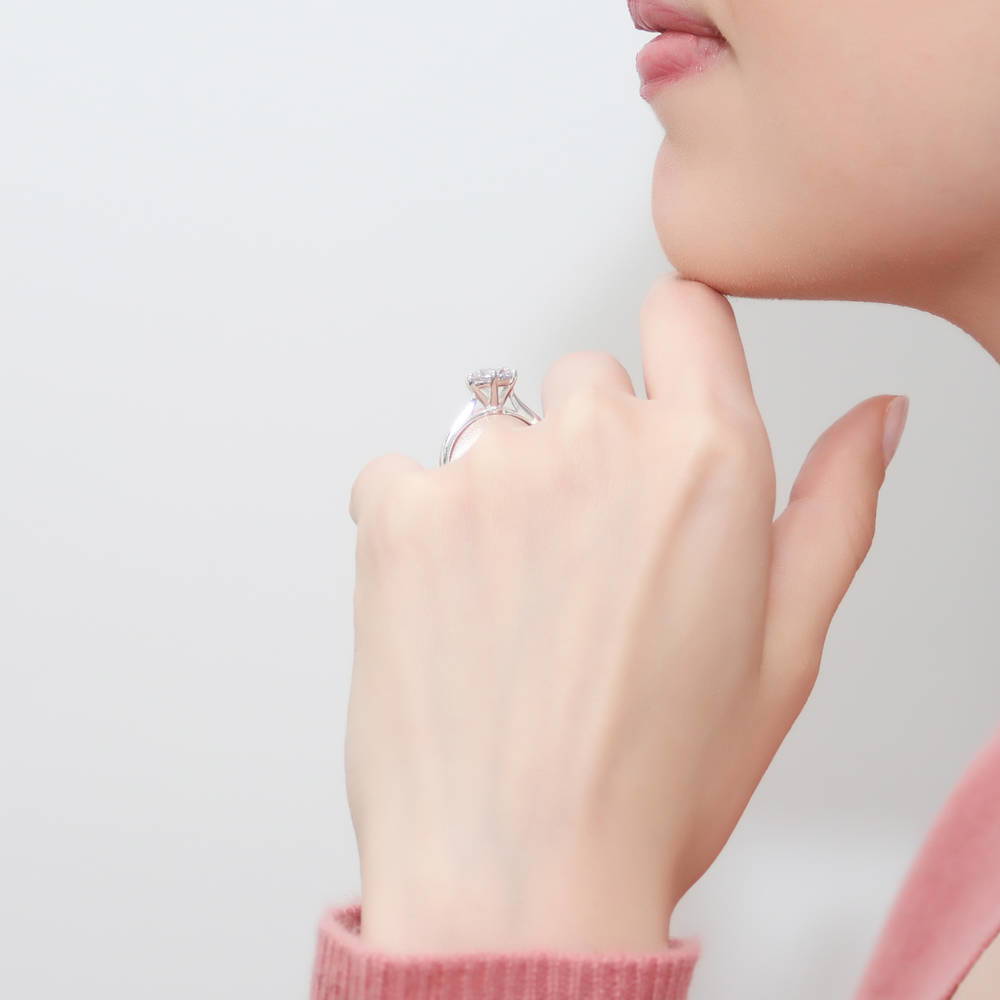 Model wearing Solitaire 2ct Round CZ Ring Set in Sterling Silver