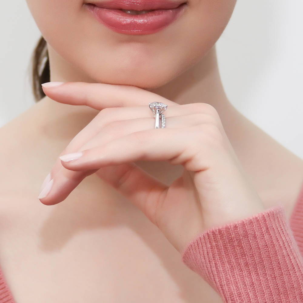 Model wearing Solitaire 2ct Round CZ Ring Set in Sterling Silver