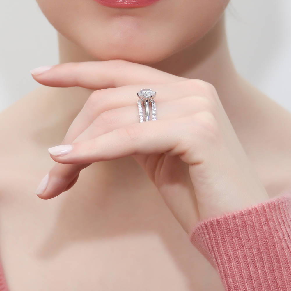 Model wearing Solitaire 2ct Round CZ Ring Set in Sterling Silver