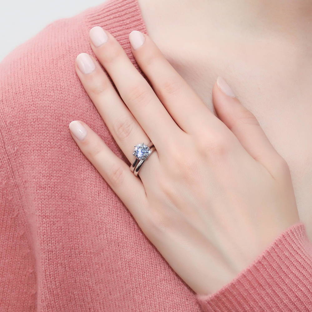 Model wearing Solitaire 2ct Round CZ Ring Set in Sterling Silver