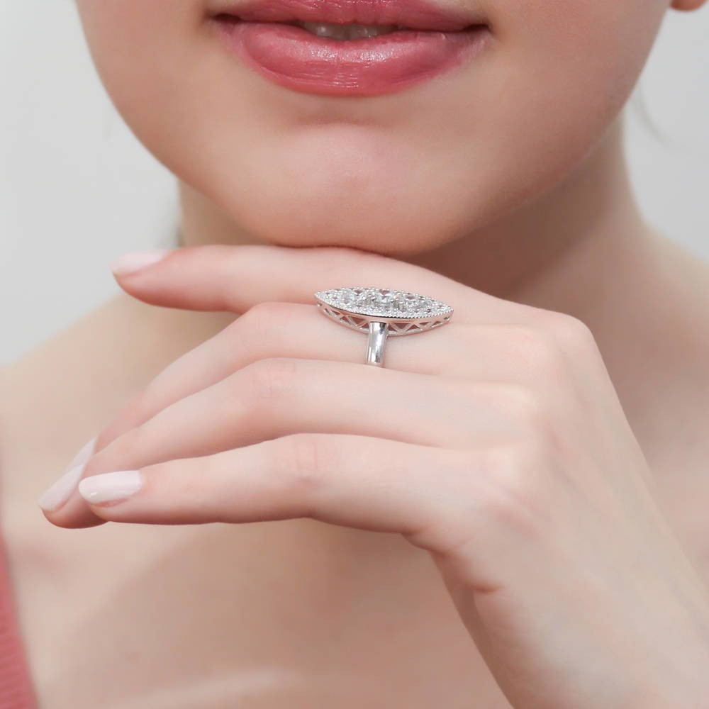 Model wearing 3-Stone Navette Round CZ Statement Ring in Sterling Silver