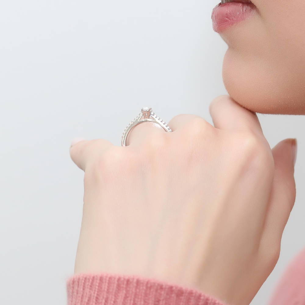 Model wearing Solitaire 0.3ct Emerald Cut CZ Ring in Sterling Silver