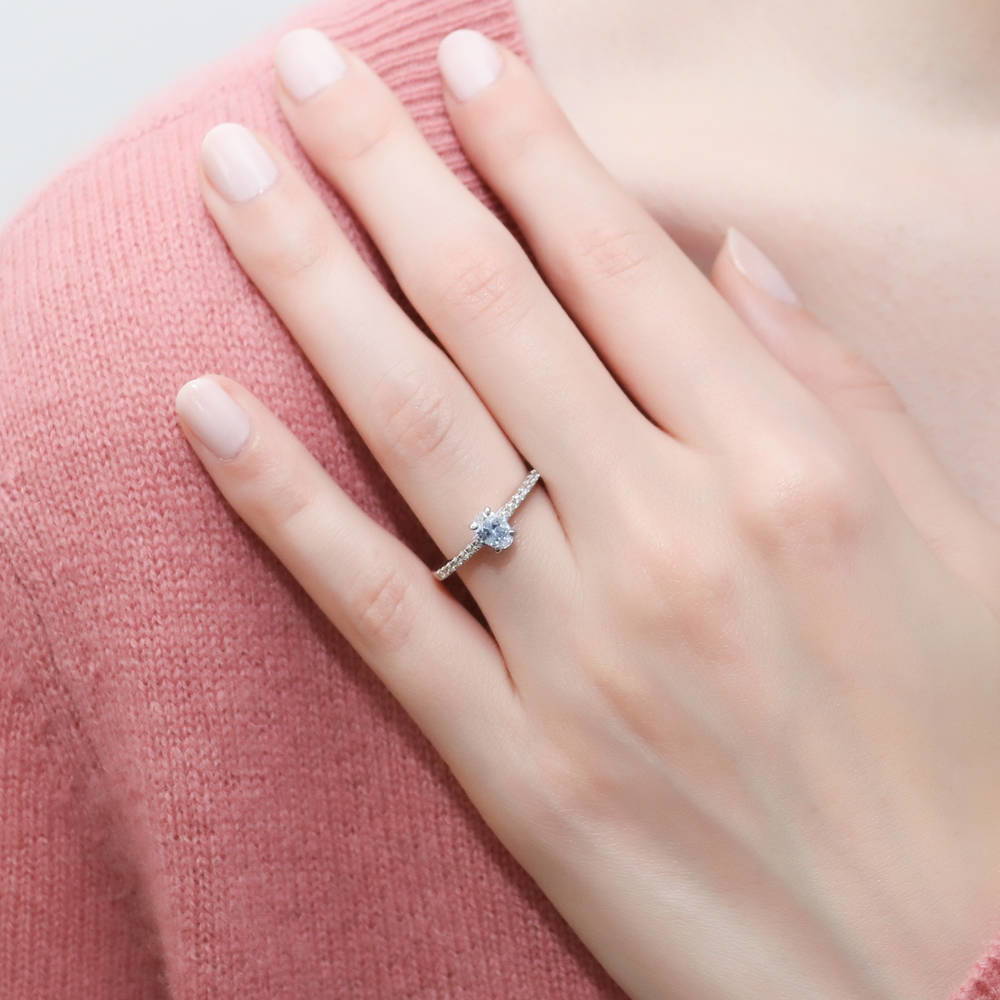 Model wearing Solitaire 0.4ct Oval CZ Ring Set in Sterling Silver, 7 of 14