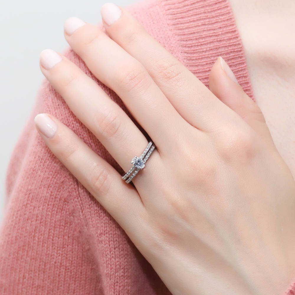 Model wearing Solitaire 0.4ct Oval CZ Ring Set in Sterling Silver