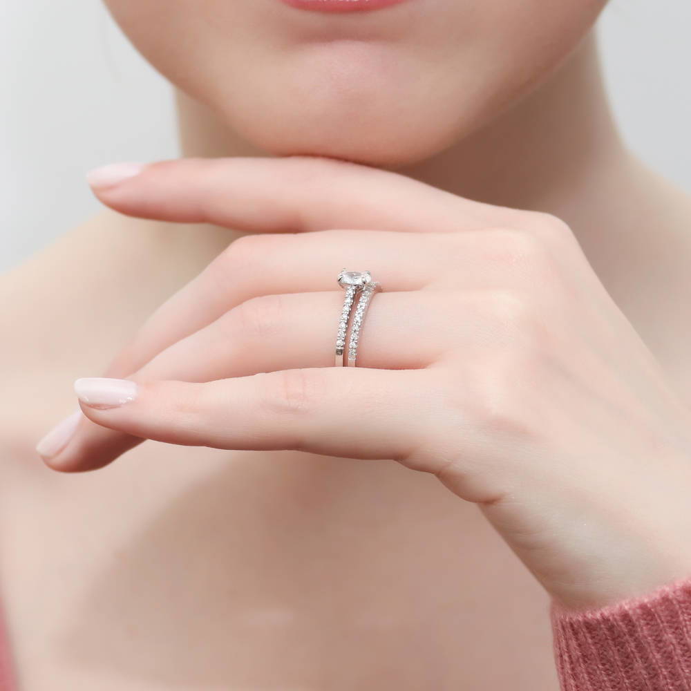 Model wearing Solitaire 0.4ct Oval CZ Ring Set in Sterling Silver
