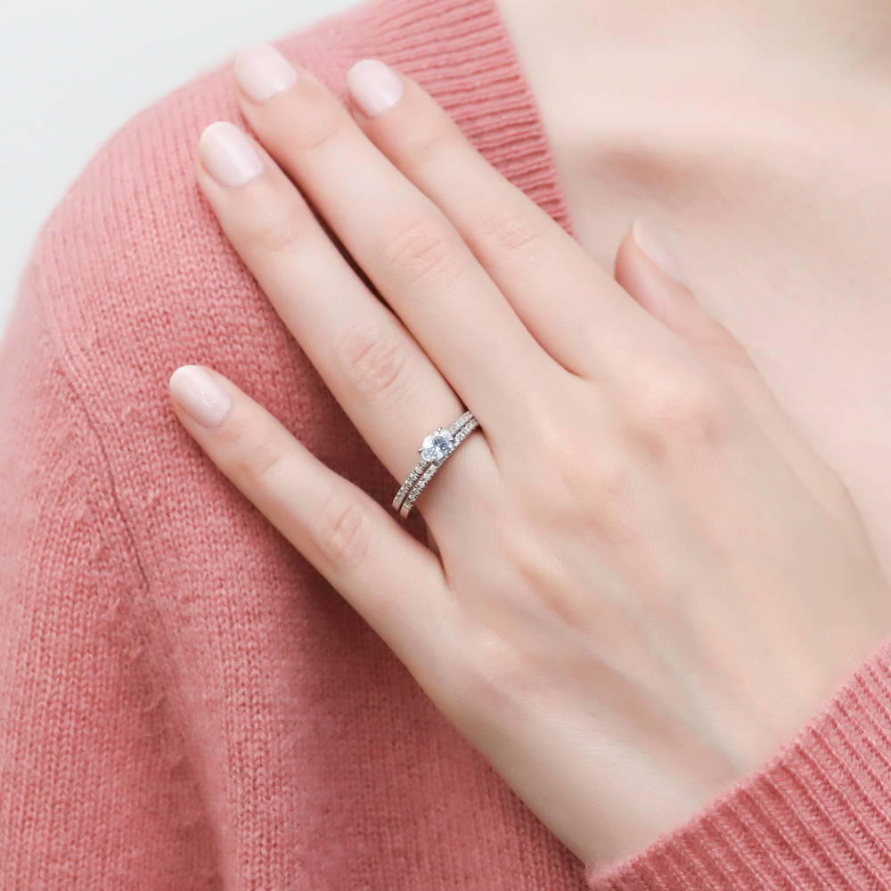 Model wearing Solitaire 0.4ct Oval CZ Ring Set in Sterling Silver