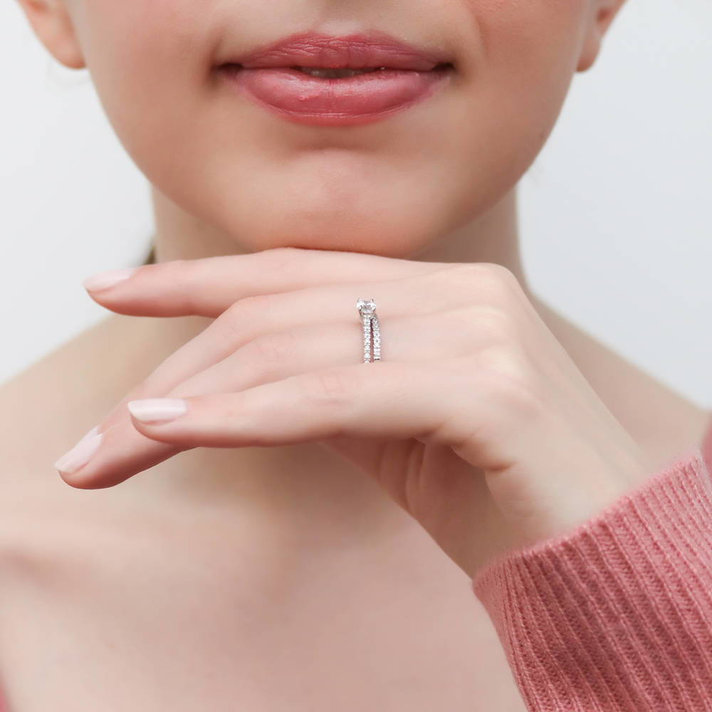 Model wearing Solitaire 0.4ct Oval CZ Ring Set in Sterling Silver