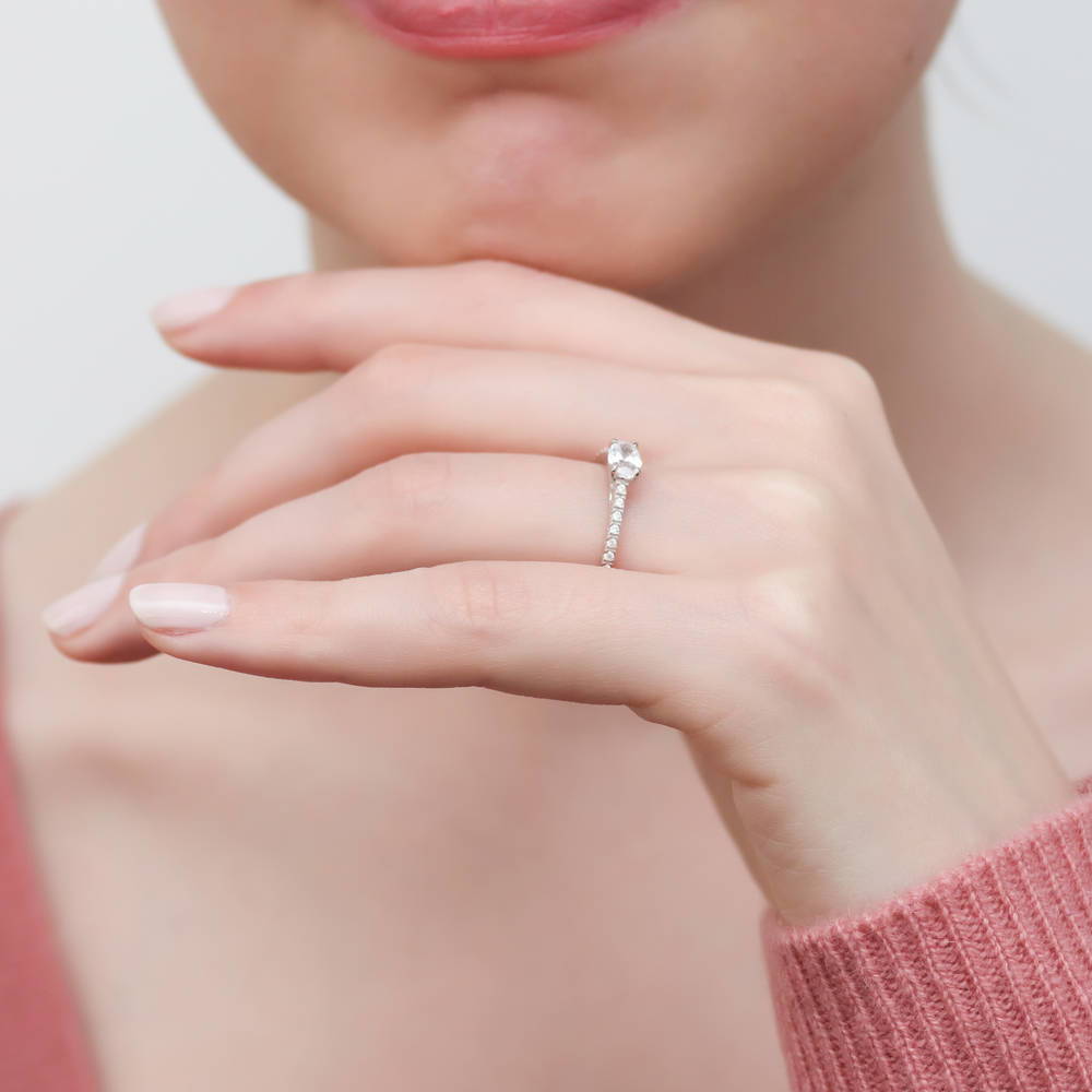 Model wearing Solitaire 0.4ct Oval CZ Ring in Sterling Silver, 6 of 9