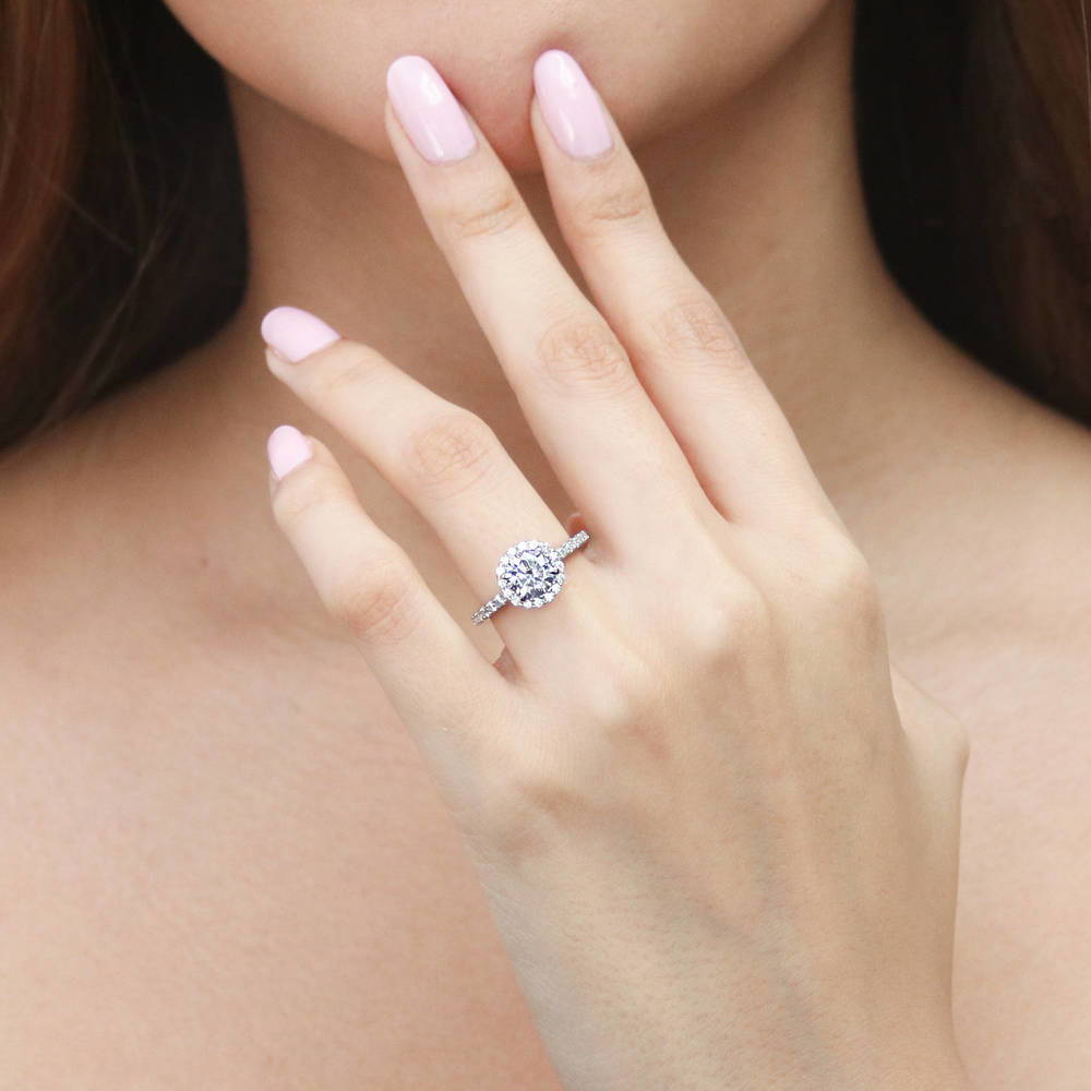 Model wearing Halo Round CZ Ring in Sterling Silver