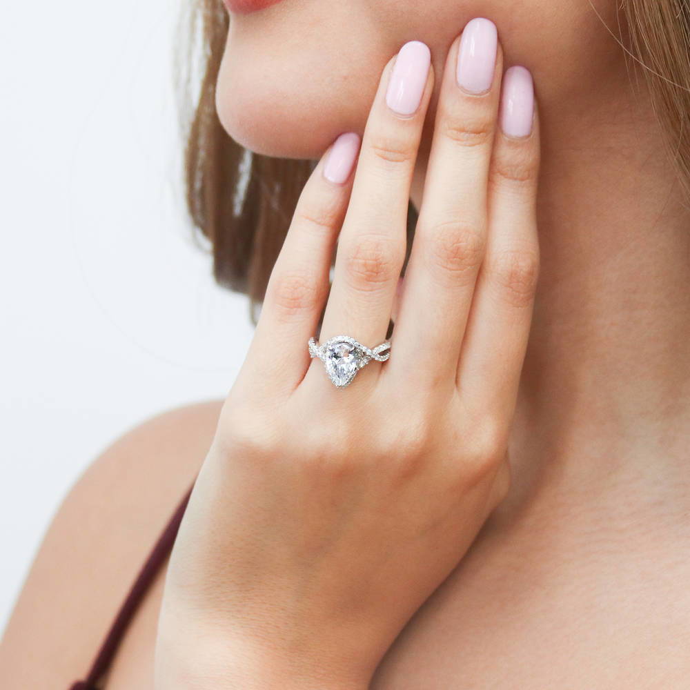 Model wearing Woven Halo CZ Ring in Sterling Silver