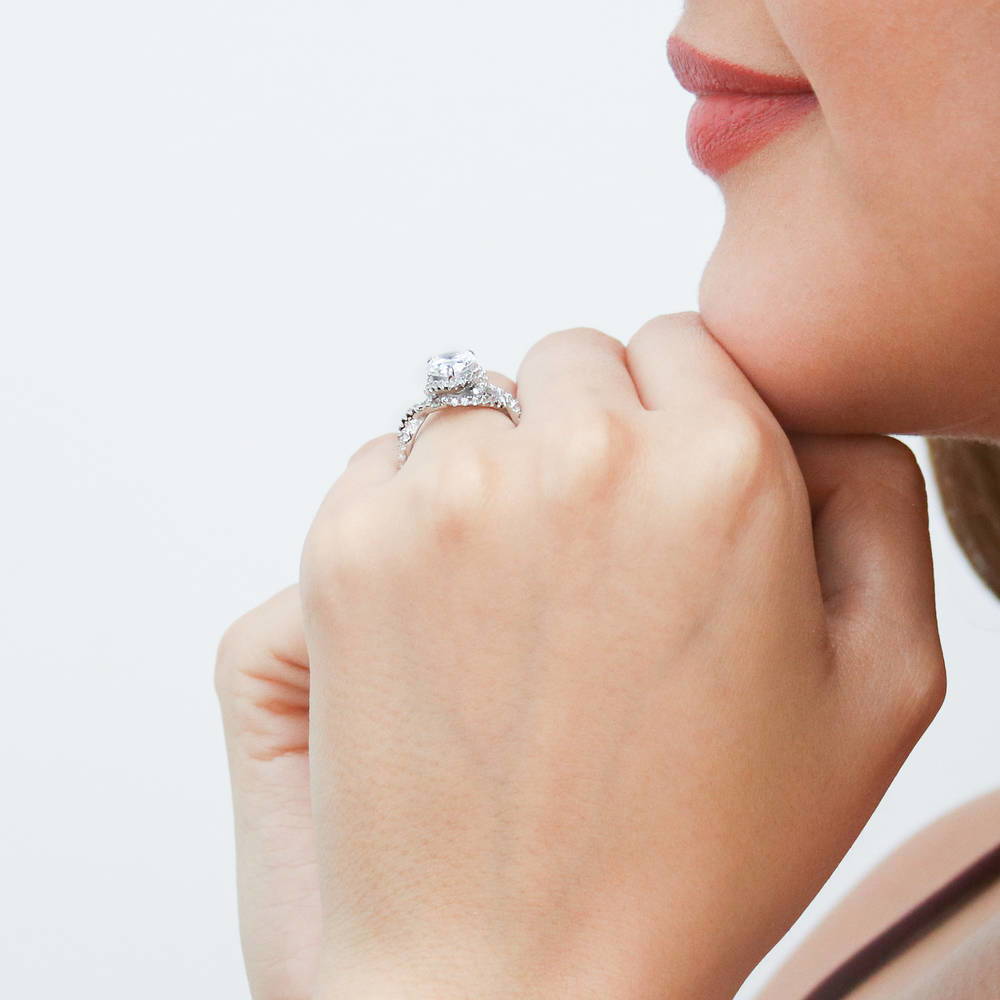 Model wearing Woven Halo CZ Ring in Sterling Silver