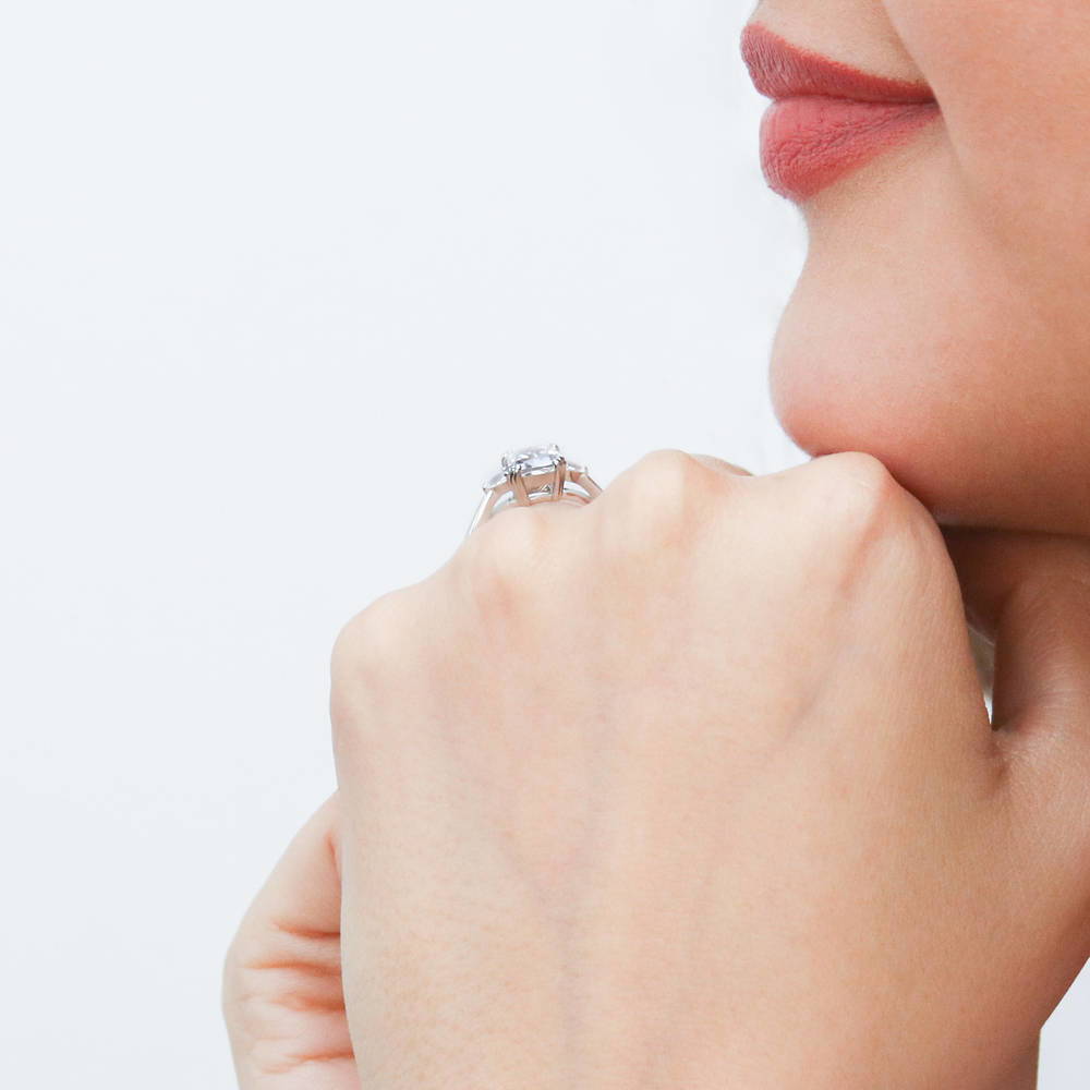 Model wearing 3-Stone Cushion CZ Ring in Sterling Silver, 6 of 11