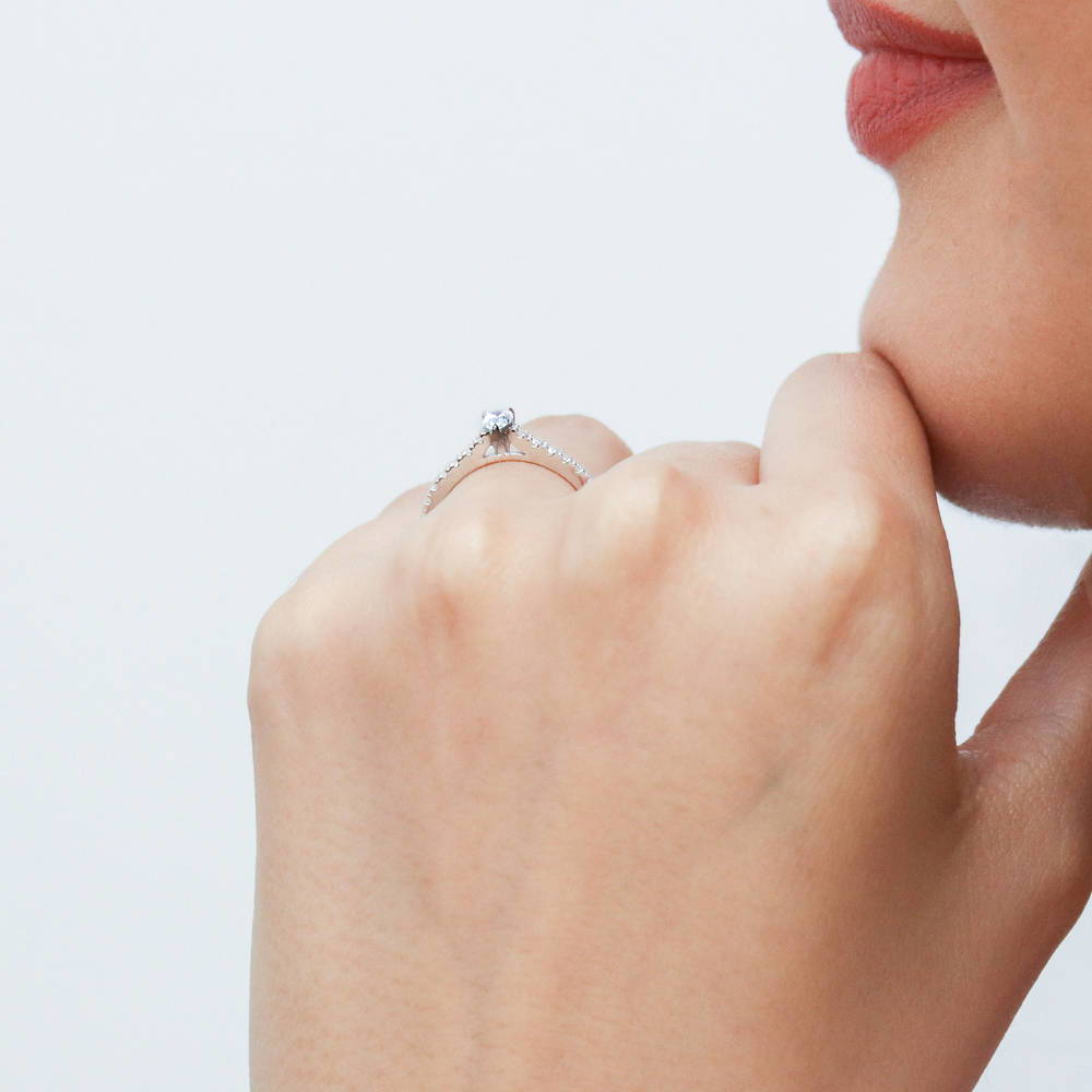 Model wearing Solitaire 0.3ct Pear CZ Ring in Sterling Silver