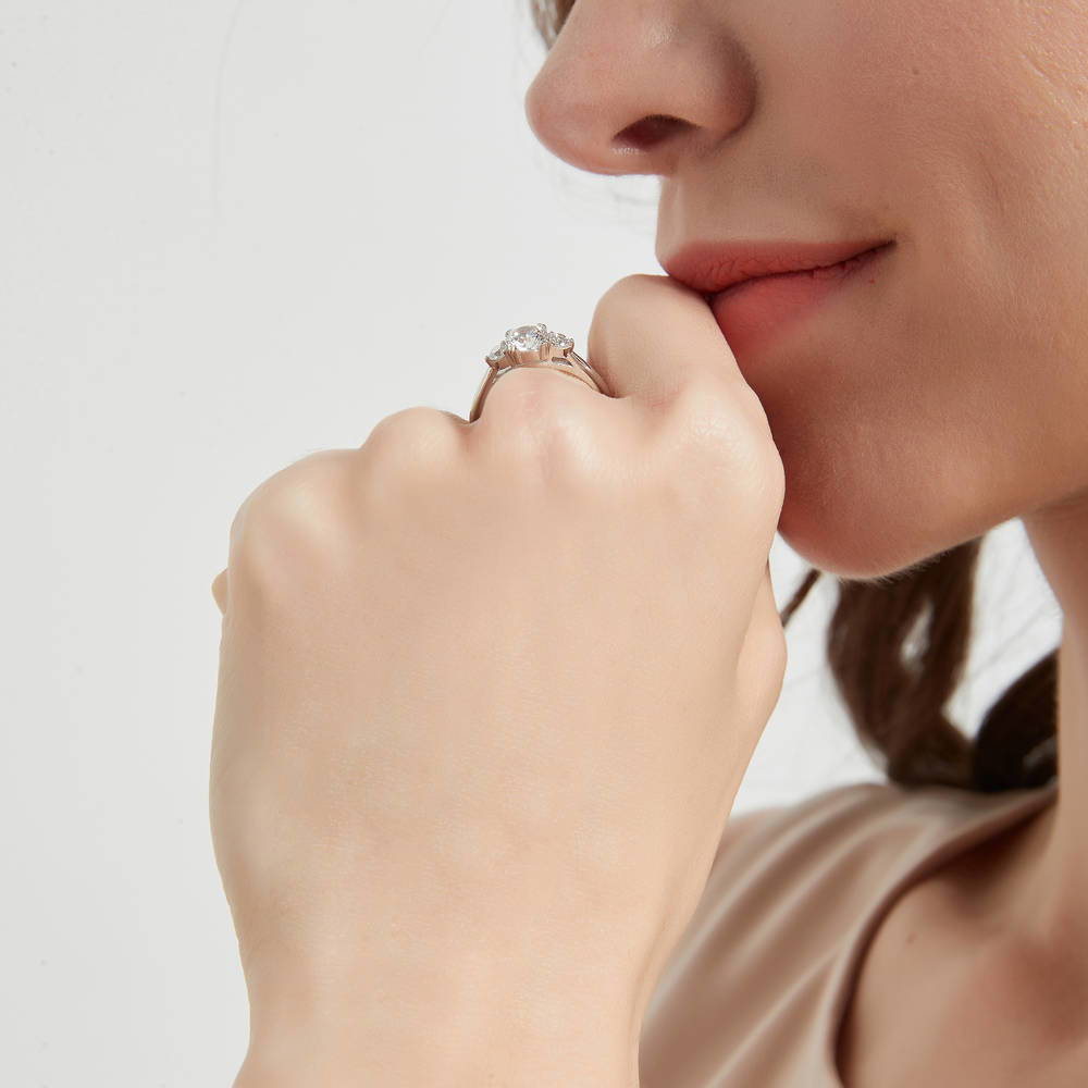 Model wearing 3-Stone Round CZ Ring in Sterling Silver