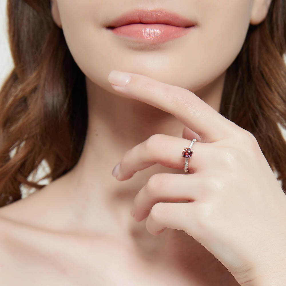 Model wearing Solitaire Red Orange Round CZ Ring in Sterling Silver 0.8ct