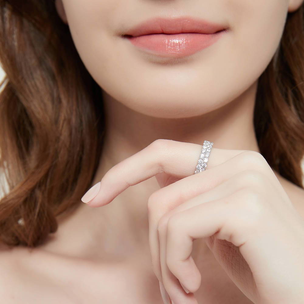 Model wearing Pave Set CZ Eternity Ring in Sterling Silver