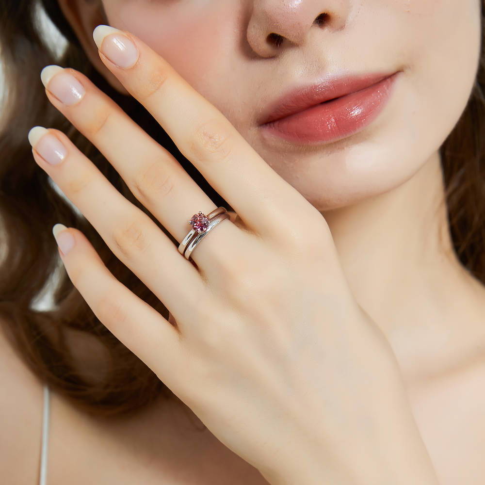 Model wearing Kaleidoscope Solitaire Red Orange CZ Ring Set in Sterling Silver