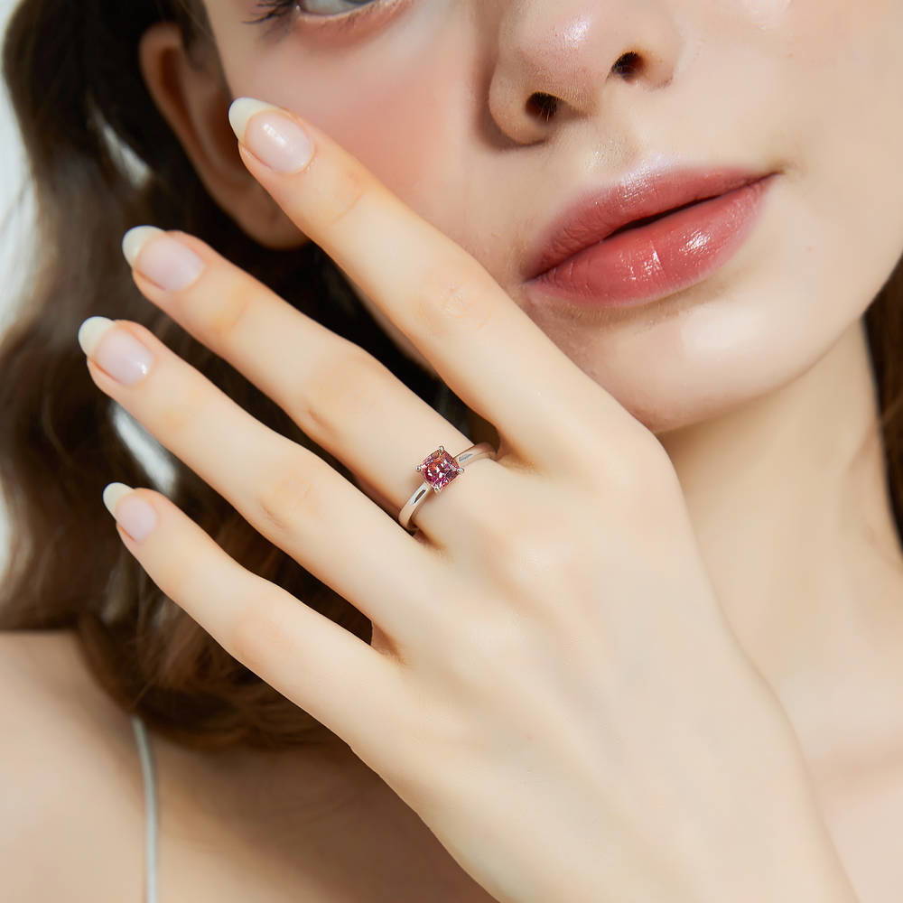 Model wearing Solitaire Red Orange Cushion CZ Ring in Sterling Silver 1.25ct