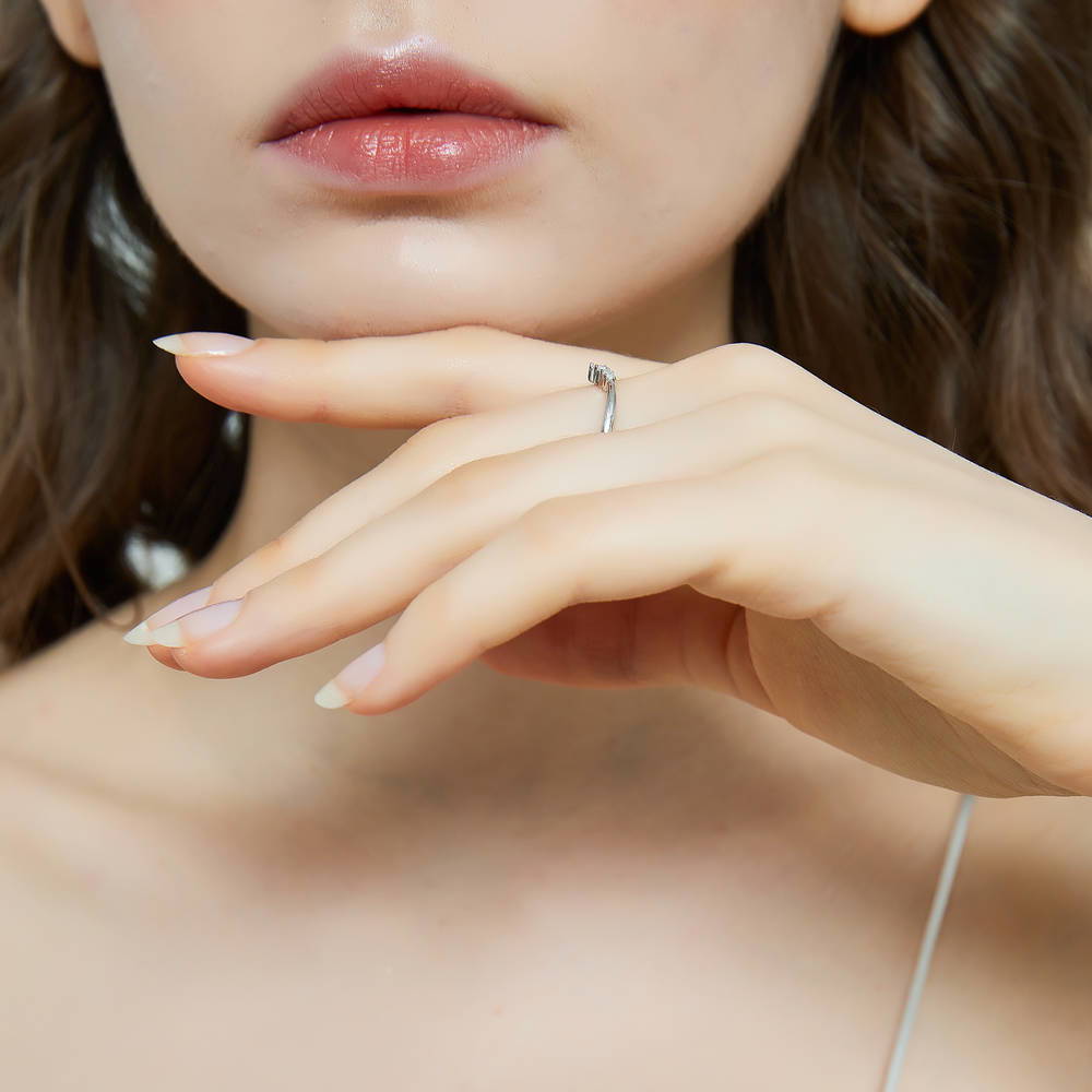Model wearing Wishbone 7-Stone CZ Curved Band in Sterling Silver