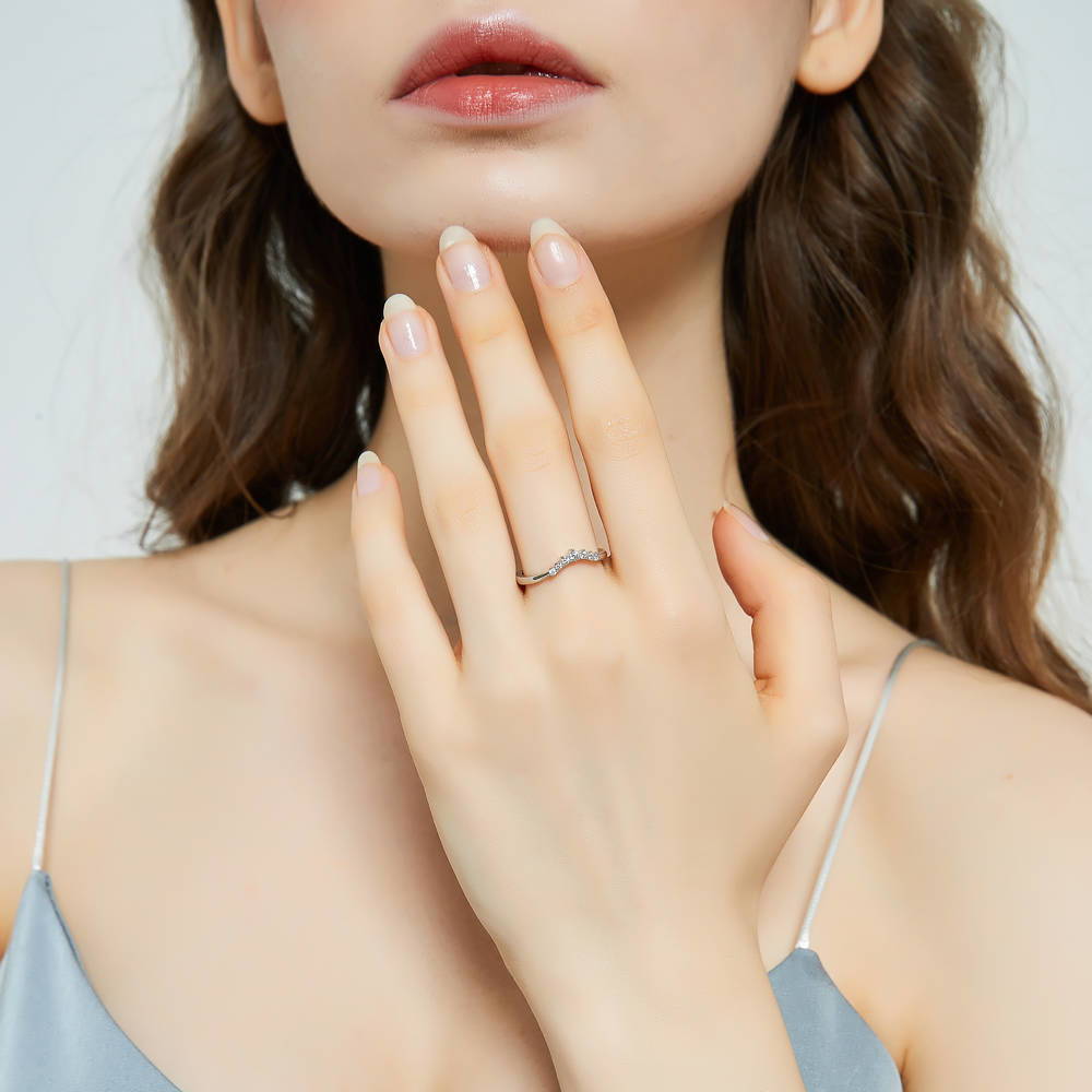 Model wearing Wishbone 7-Stone CZ Curved Band in Sterling Silver