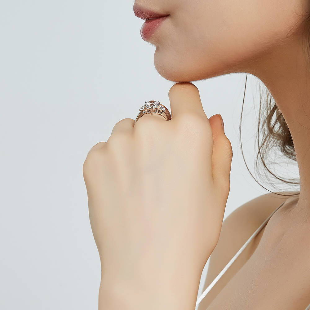 Model wearing 3-Stone Round CZ Ring in Sterling Silver