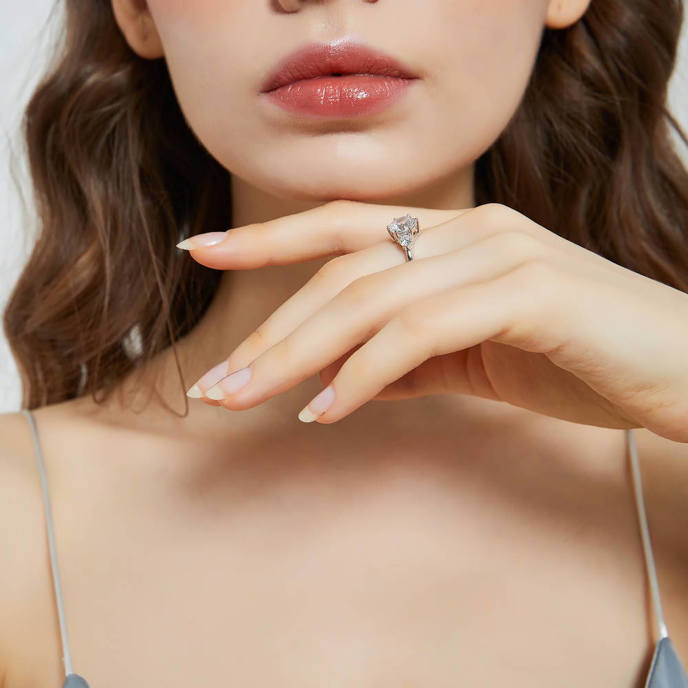 Model wearing 3-Stone Round CZ Ring in Sterling Silver