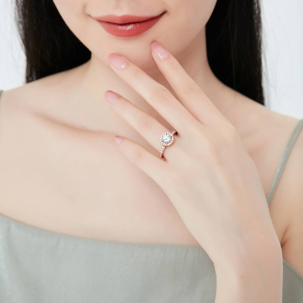 Model wearing Halo Round CZ Ring in Rose Gold Plated Sterling Silver