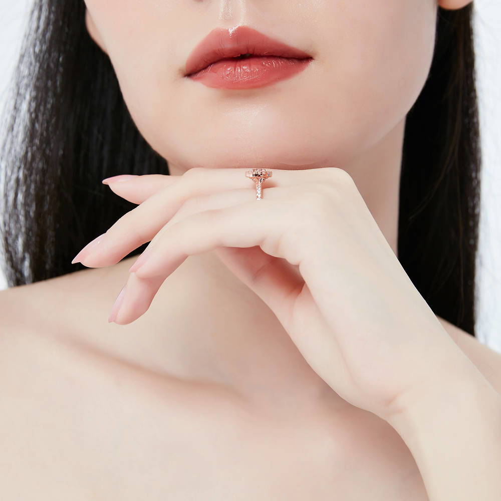 Model wearing Halo Round CZ Ring in Rose Gold Plated Sterling Silver