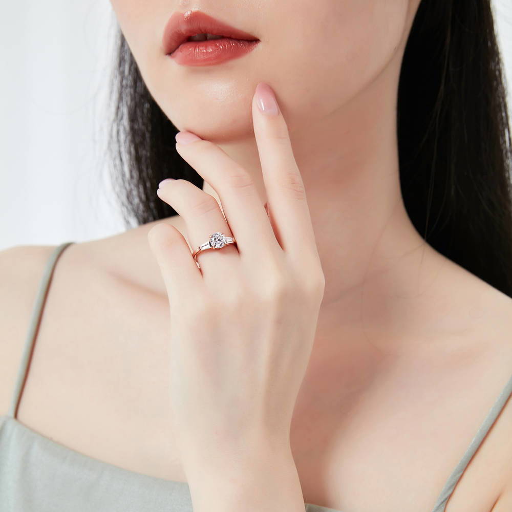 Model wearing Solitaire 1ct Round CZ Ring in Rose Gold Plated Sterling Silver