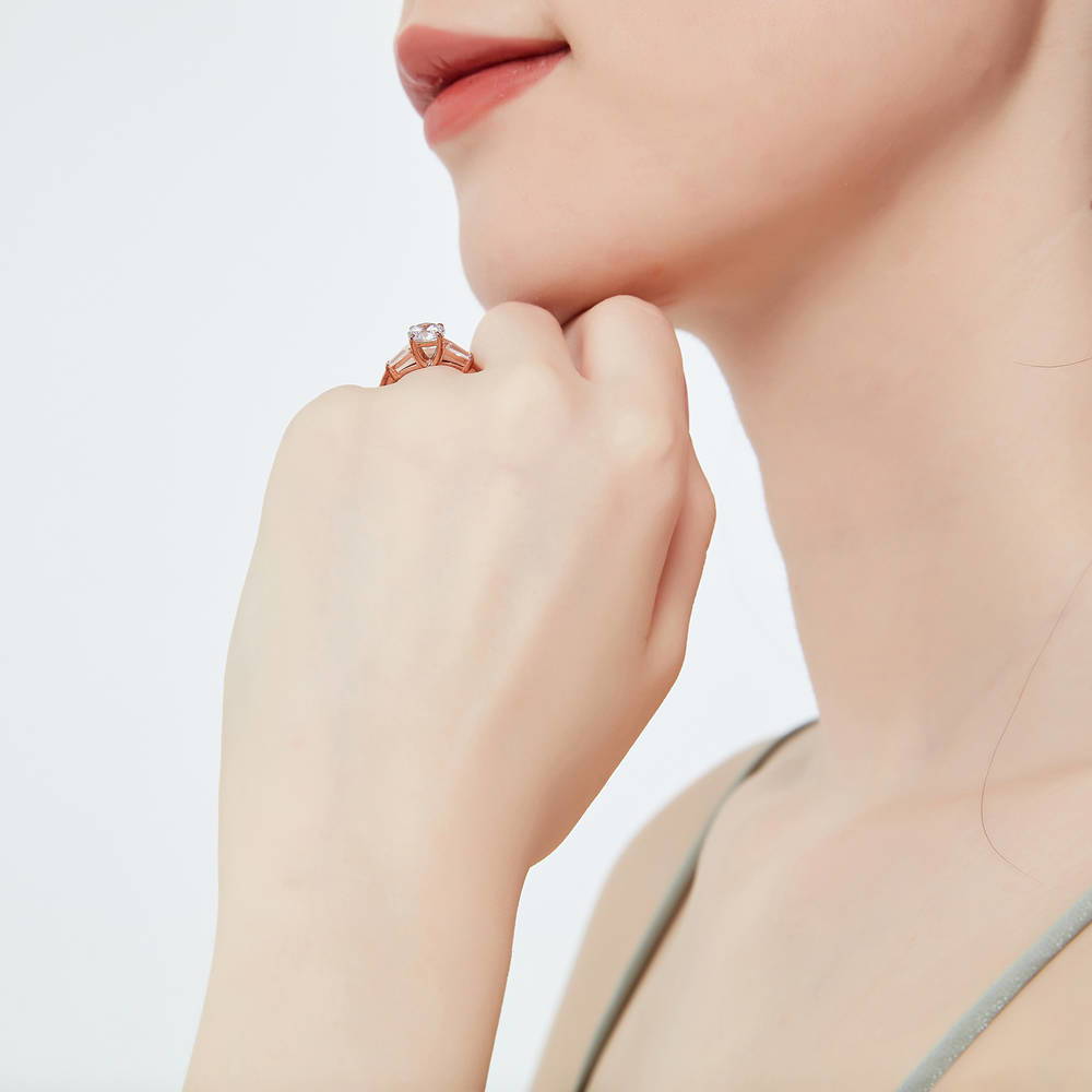 Model wearing Solitaire 1ct Round CZ Ring in Rose Gold Plated Sterling Silver