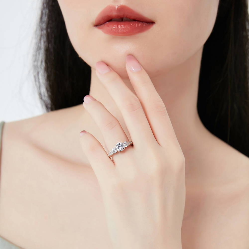 Model wearing 3-Stone Round CZ Ring in Sterling Silver