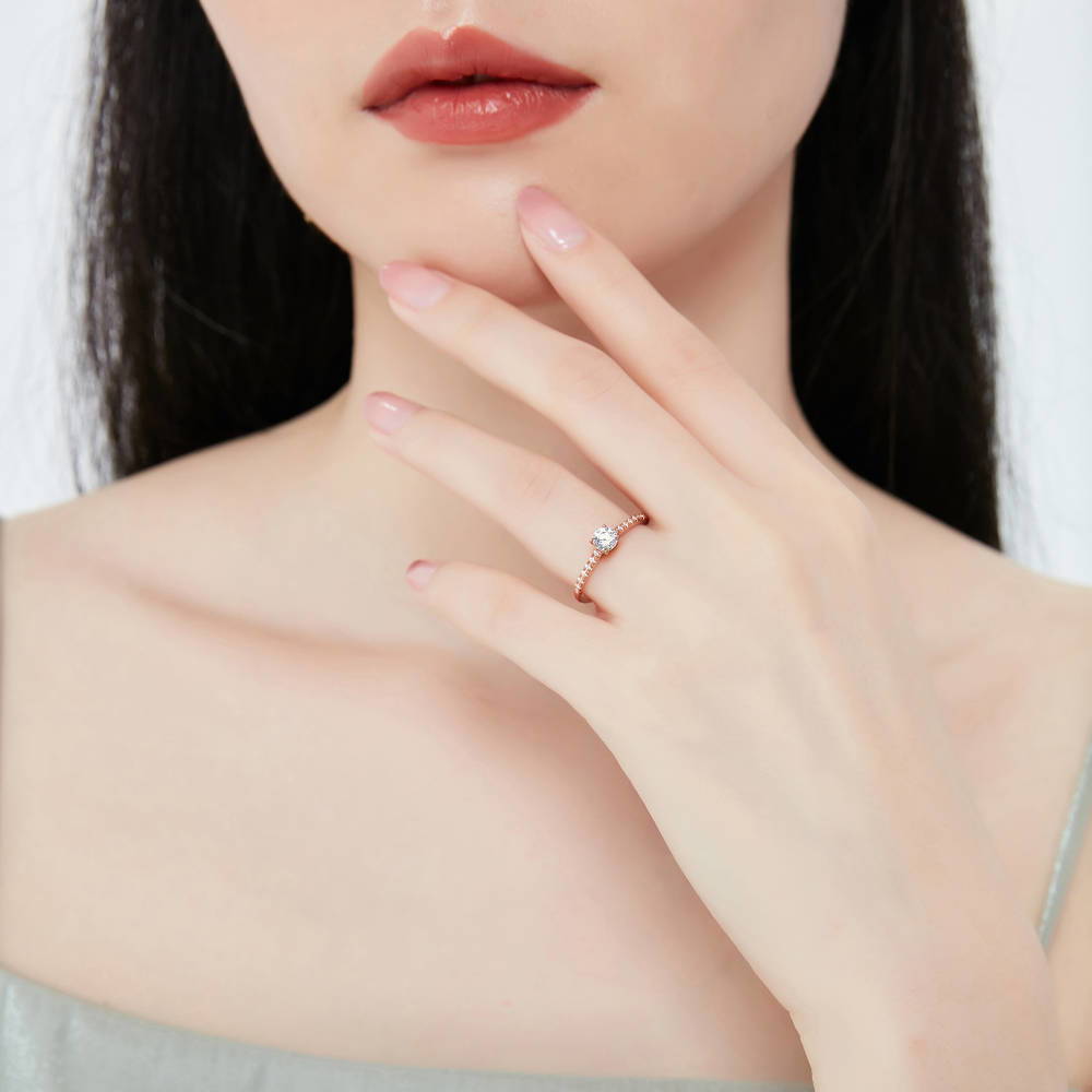 Model wearing Solitaire 0.35ct Round CZ Ring in Rose Gold Plated Sterling Silver